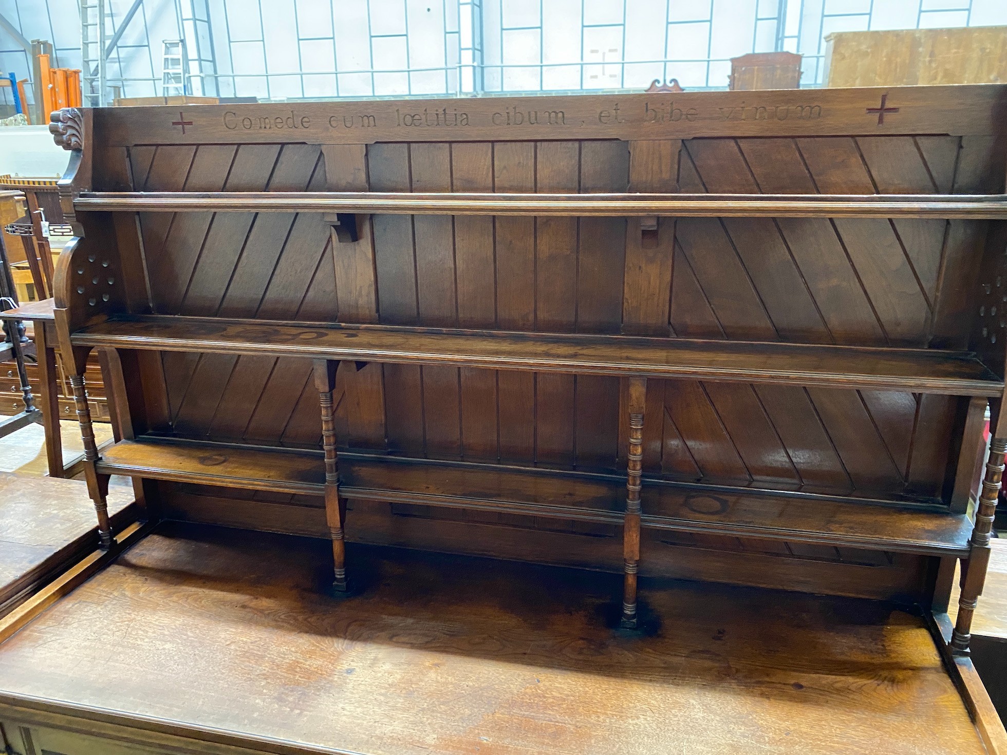 A Victorian aesthetic movement mahogany sideboard, with Latin motto to the frieze, width 168cm, depth 60cm, height 182cm